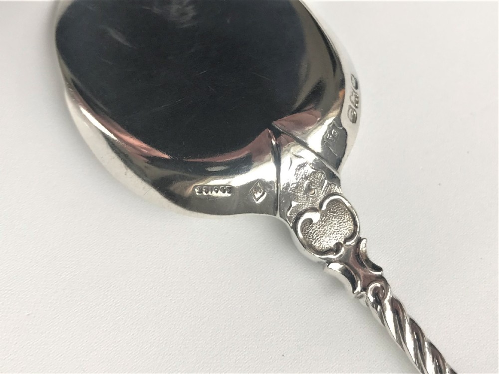 A superb pair of boxed cast silver preserve spoons View X