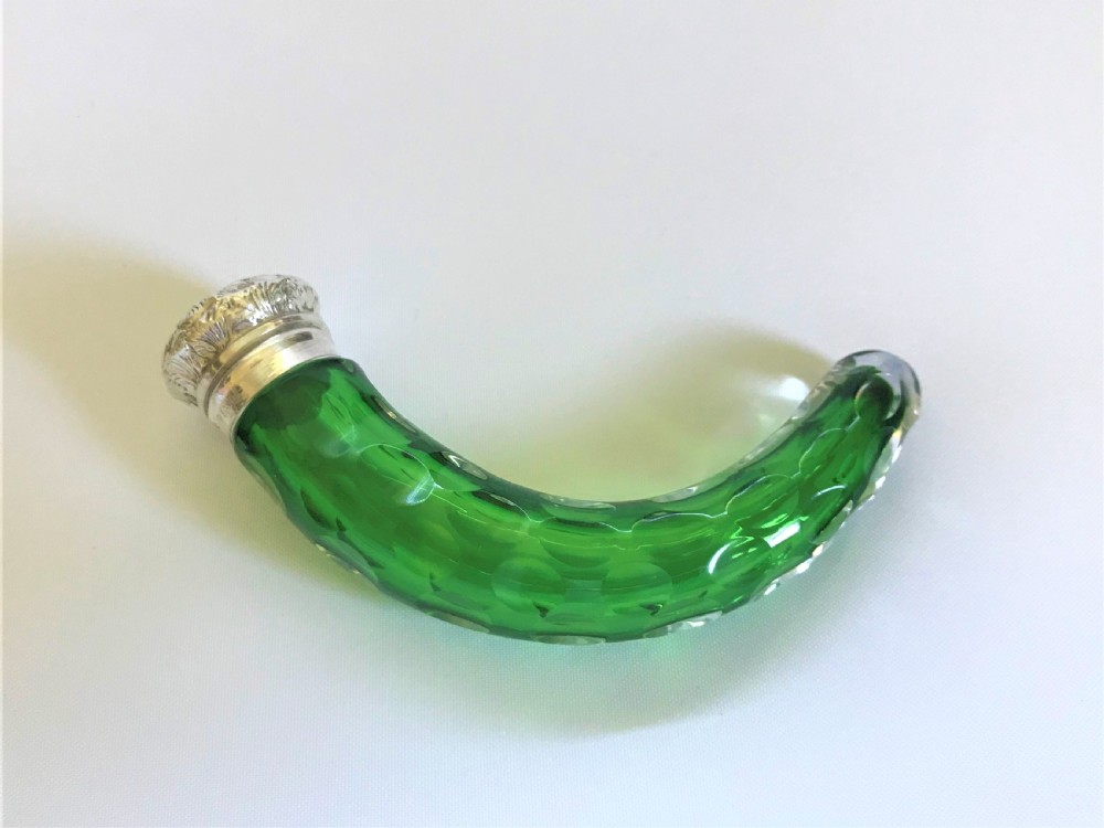 An Edwardian silver mounted 'cornucopia' emerald green scent bottle View II