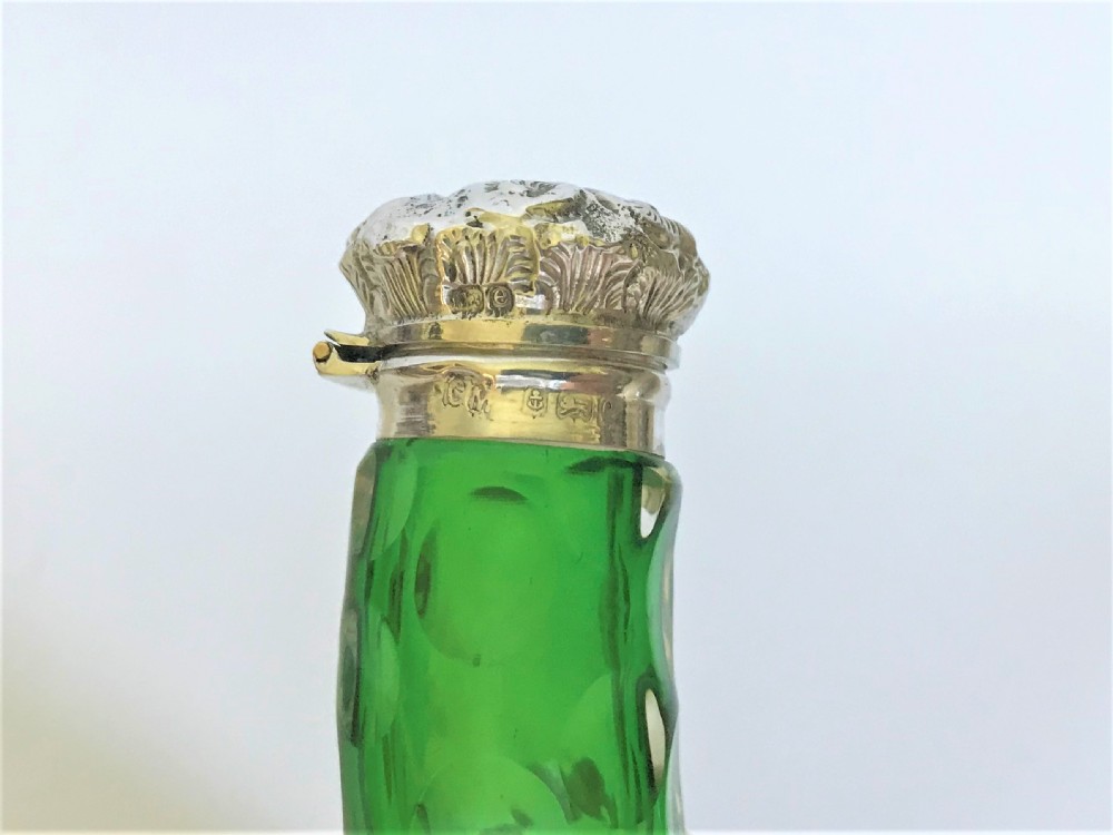 An Edwardian silver mounted 'cornucopia' emerald green scent bottle View III