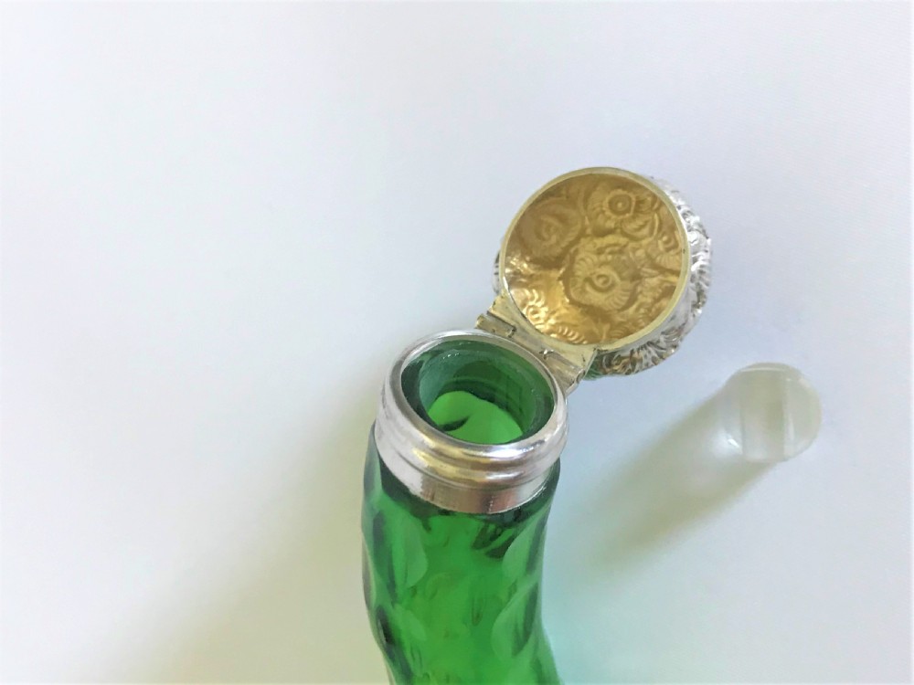 An Edwardian silver mounted 'cornucopia' emerald green scent bottle View IV