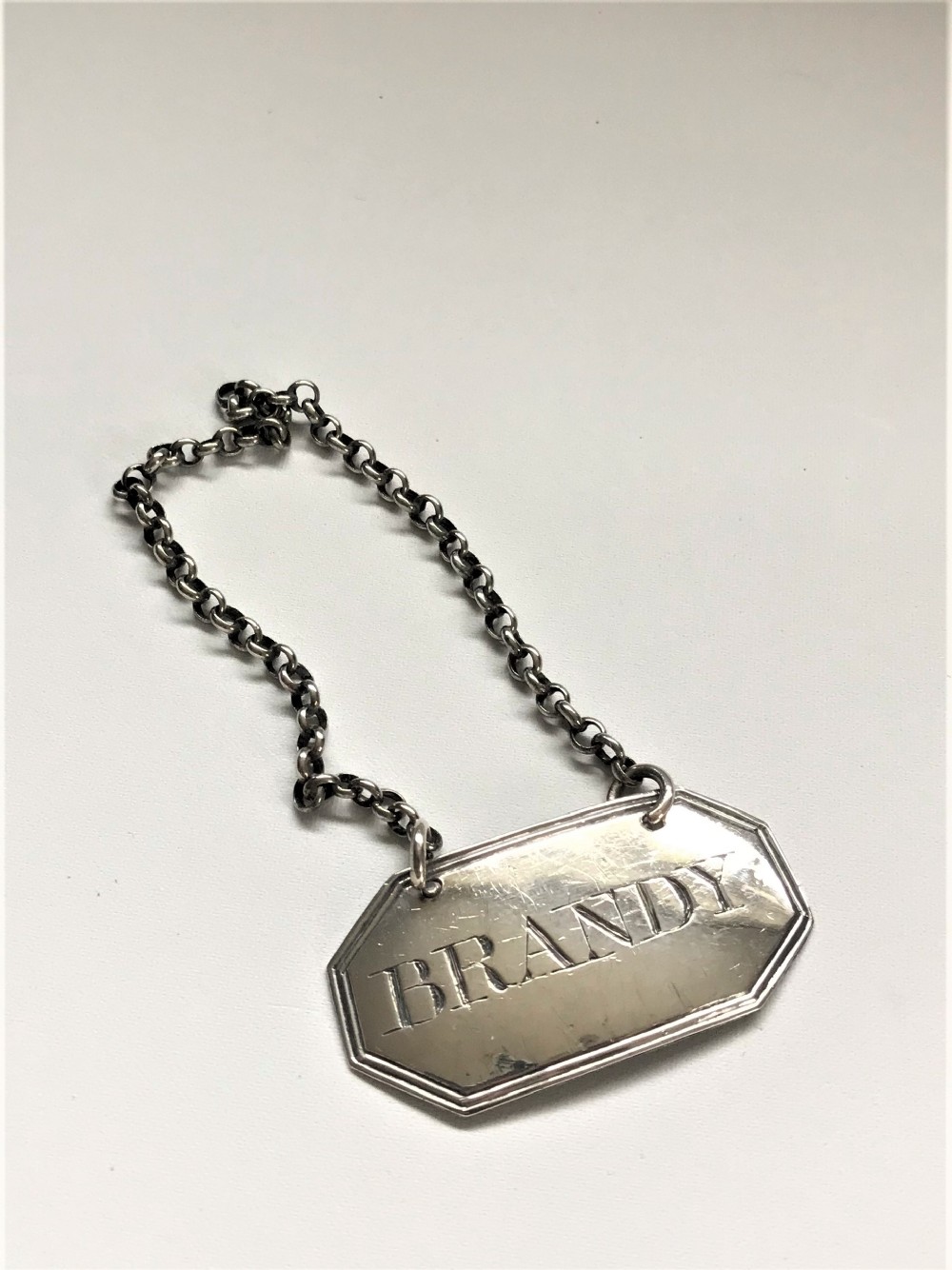 A Georgian silver Brandy decanter label