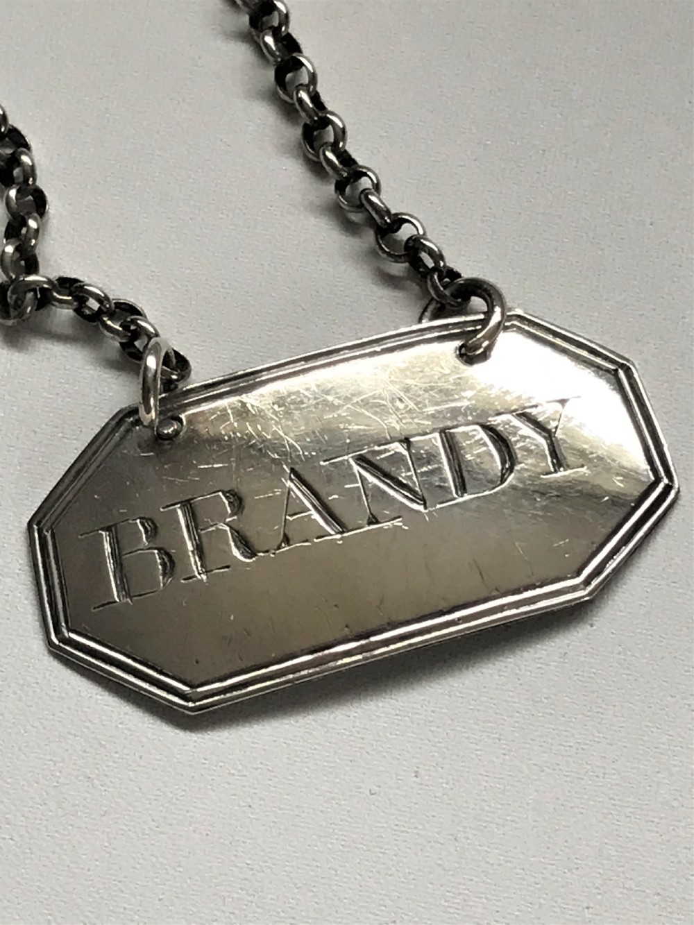 A Georgian silver Brandy decanter label View II