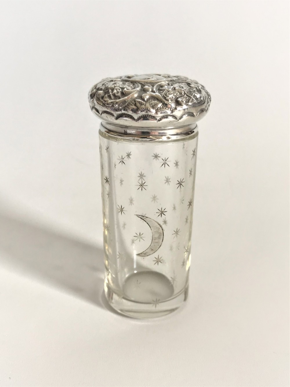 A lovely 'lunar' themed silver mounted vanity jar