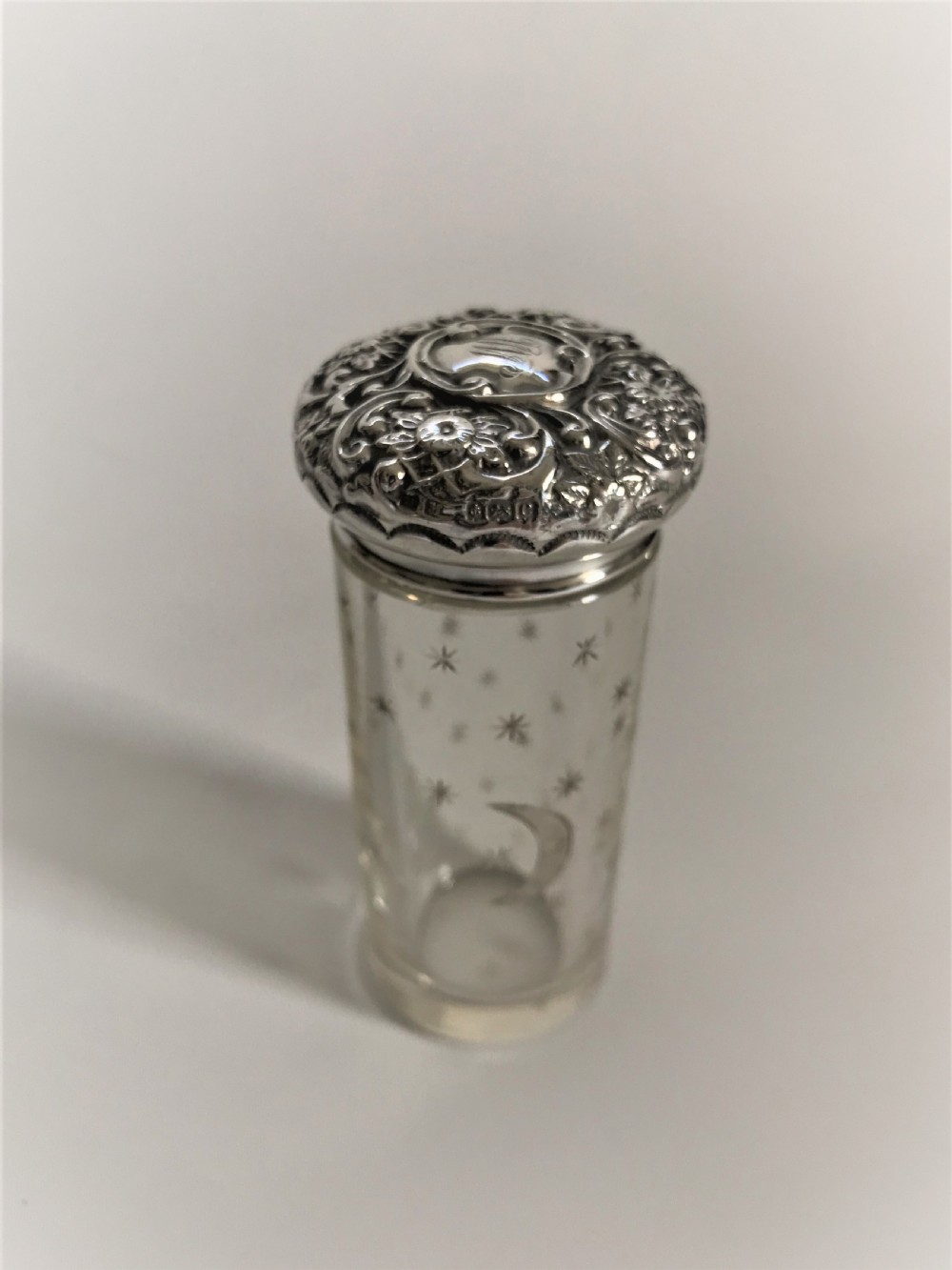 A lovely 'lunar' themed silver mounted vanity jar View V