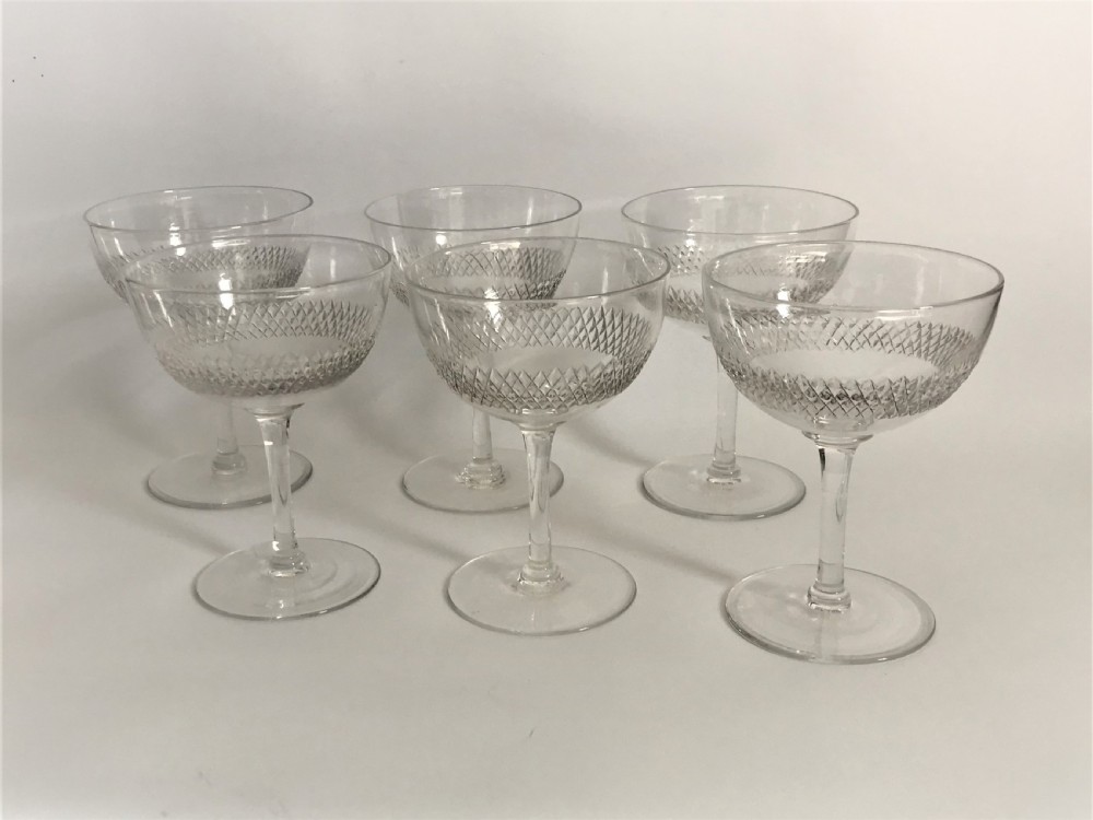 A set of 6 Edwardian cut glass champagne bowls