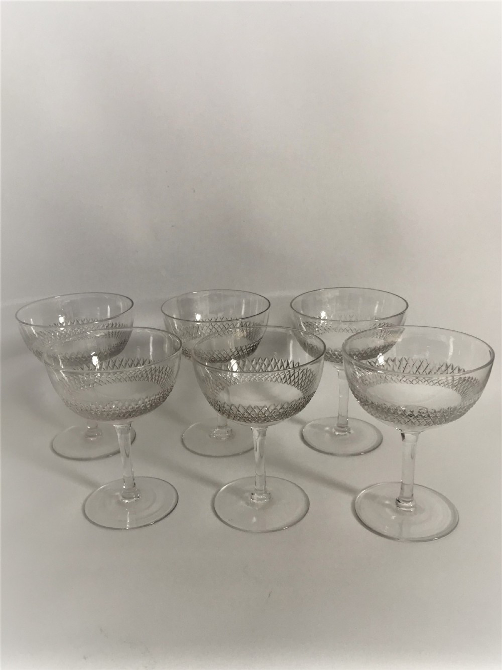 A set of 6 Edwardian cut glass champagne bowls View II