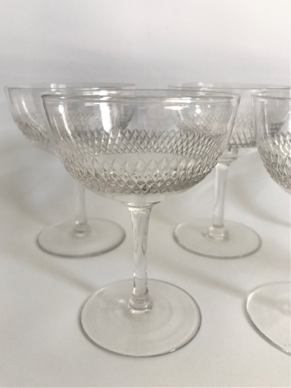 A set of 6 Edwardian cut glass champagne bowls View IV