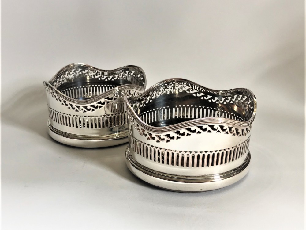 A handsome pair of early Victorian silver plated coasters