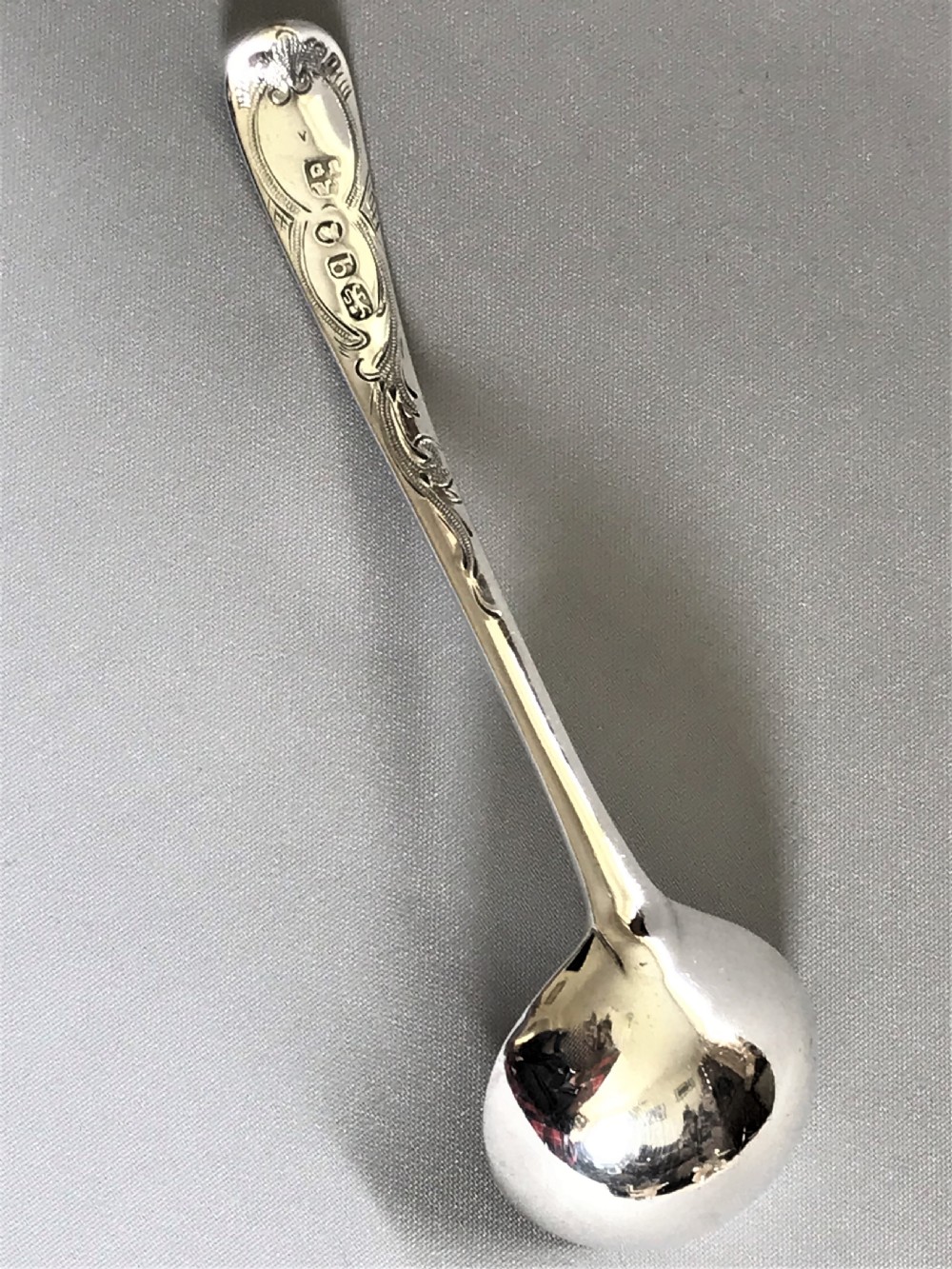 A delightful 18th Century silver cream ladle View IV
