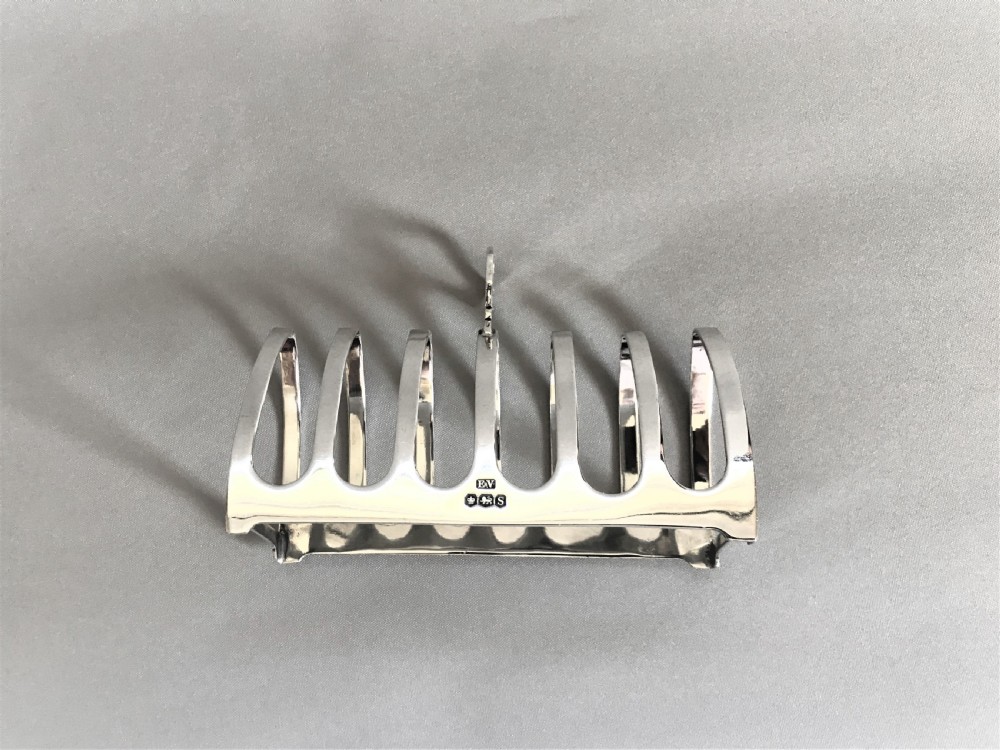 A Gothic design six slice silver toast rack  View III