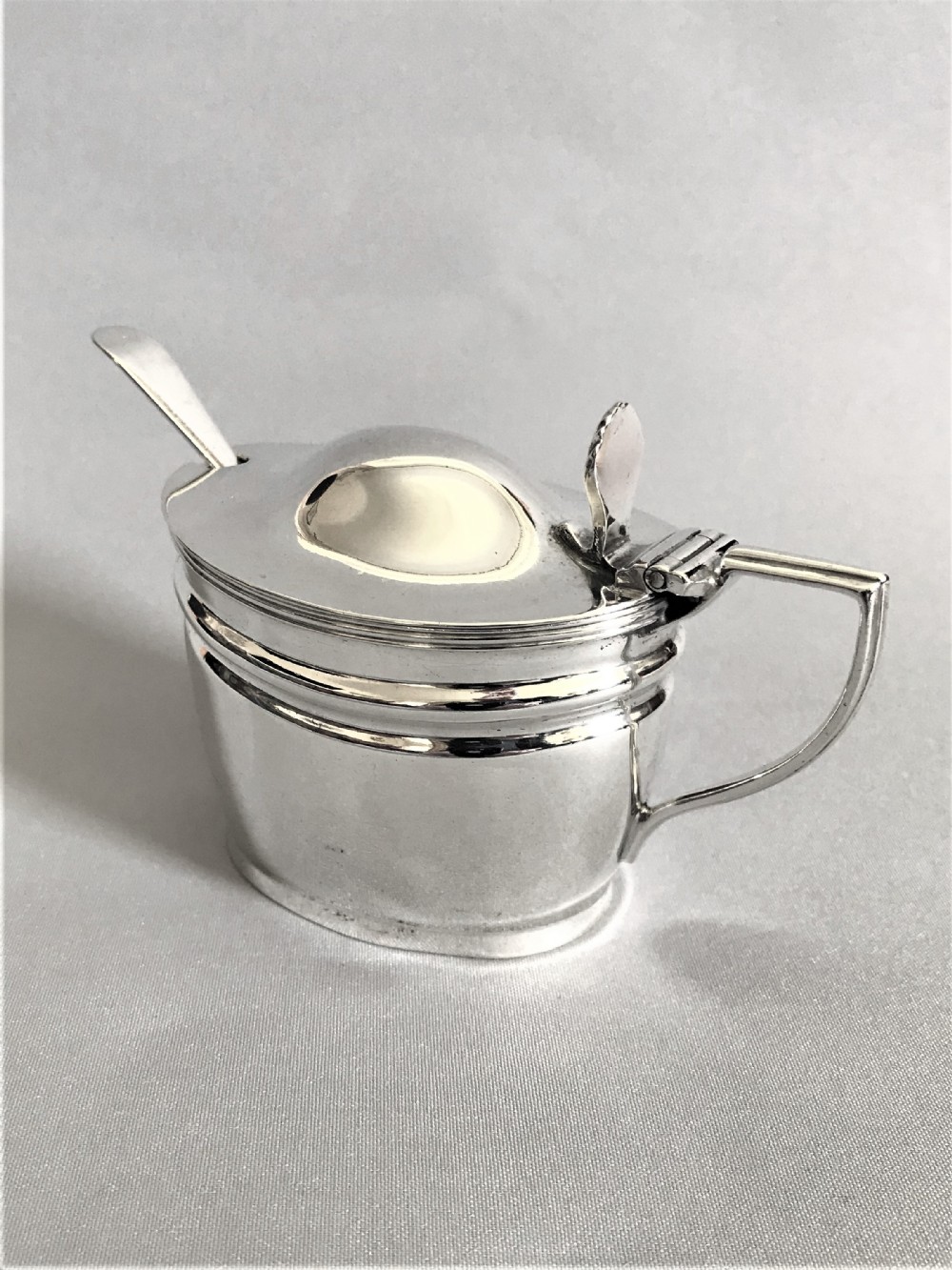 A handsome Victorian mustard pot and spoon