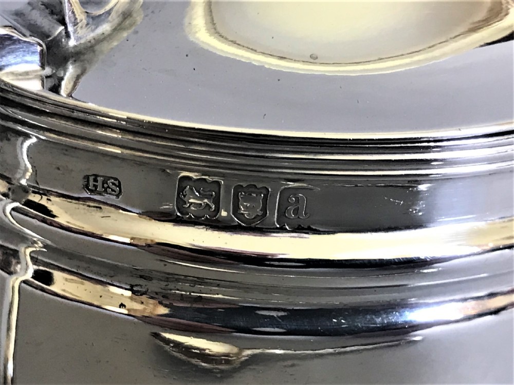 A handsome Victorian mustard pot and spoon View VI
