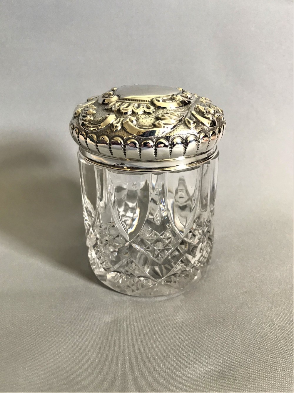 A fabulous Victorian silver topped vanity jar