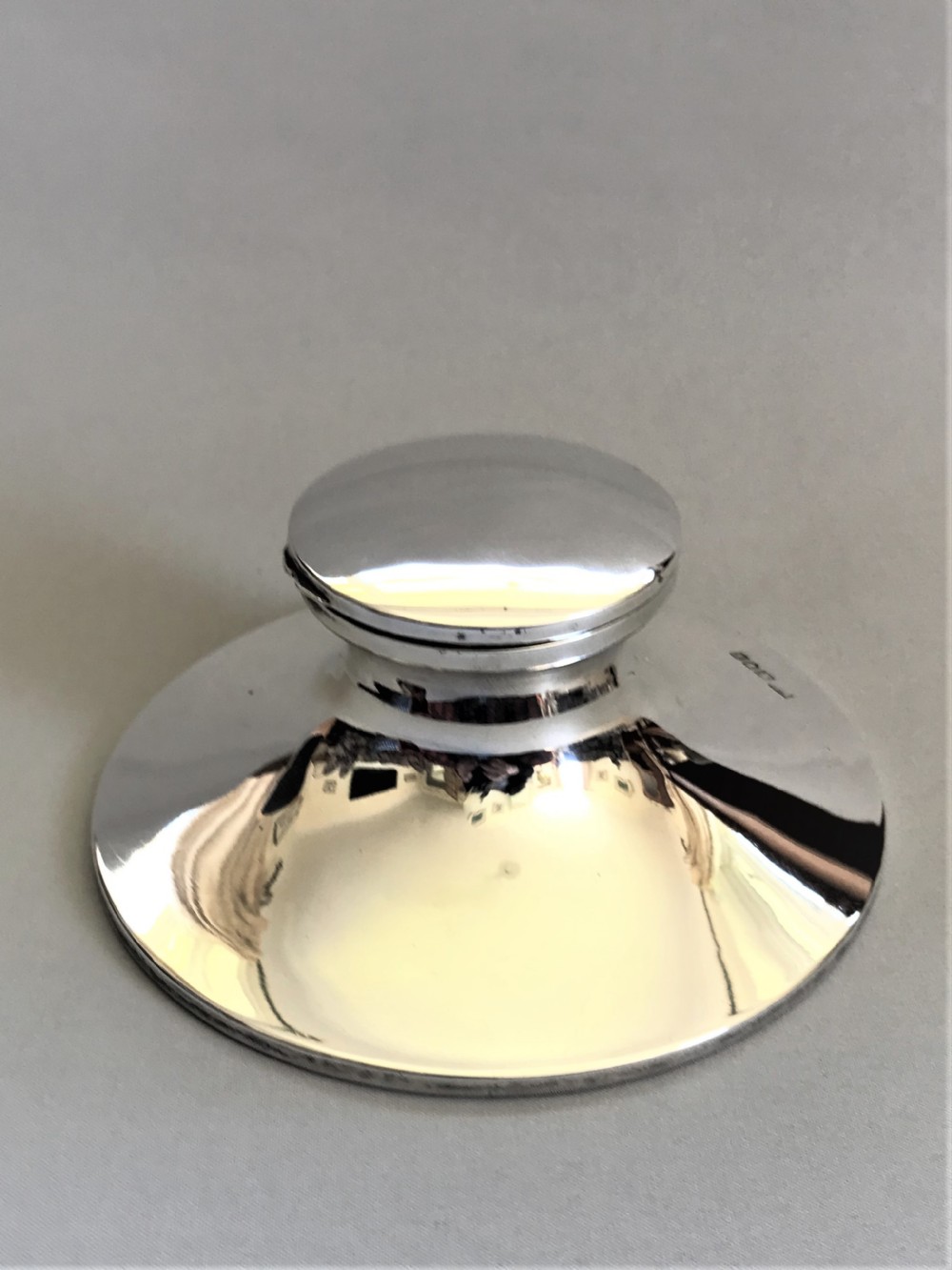 A handsome Mappin & Webb silver capstan inkwell