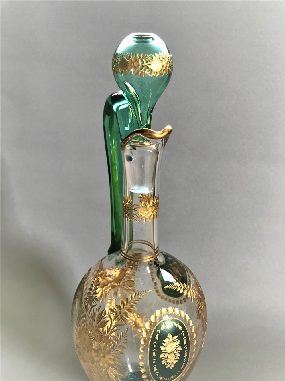 A fabulous Moser gilded wine jug and glasses View V