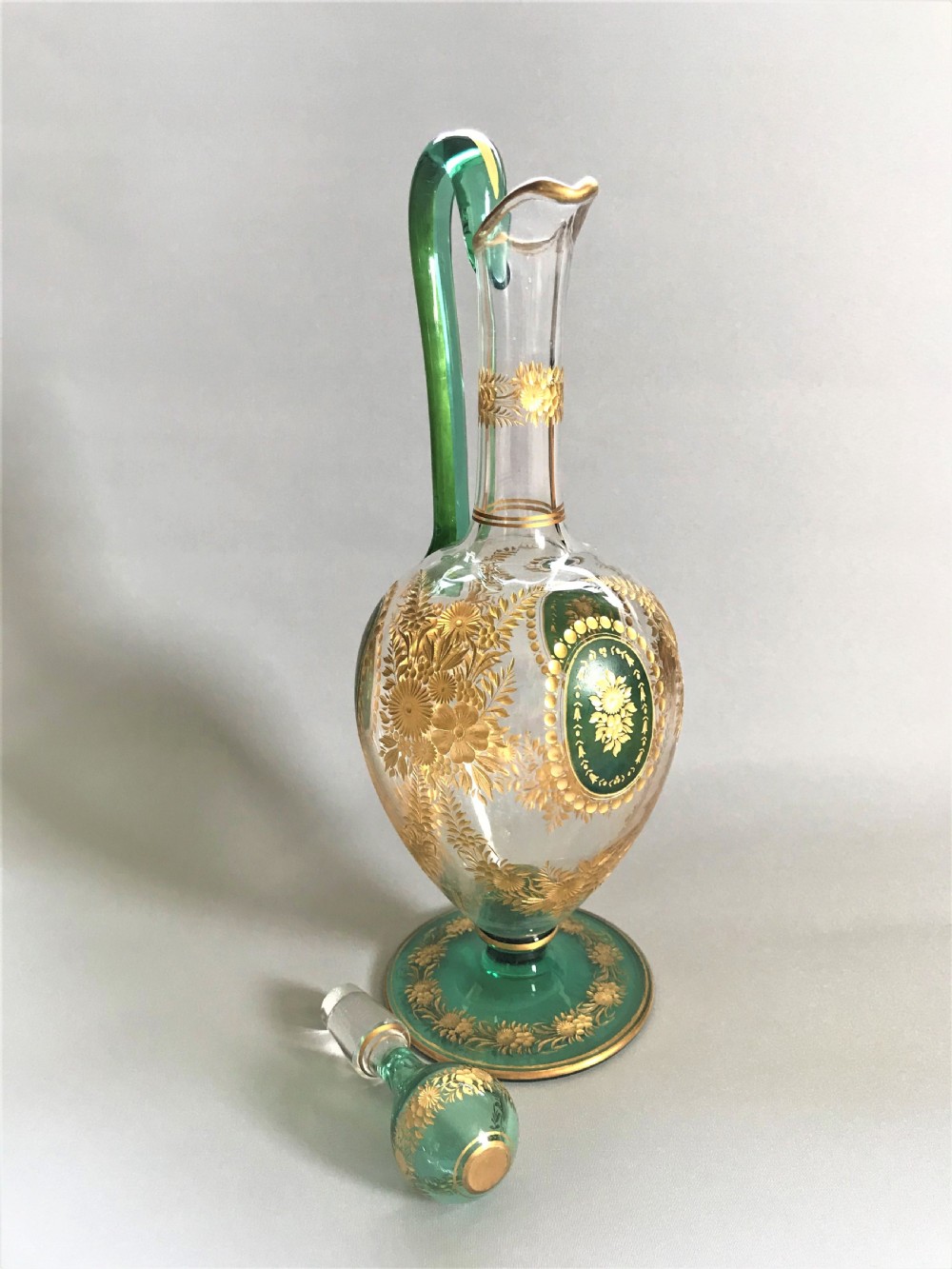 A fabulous Moser gilded wine jug and glasses View VI