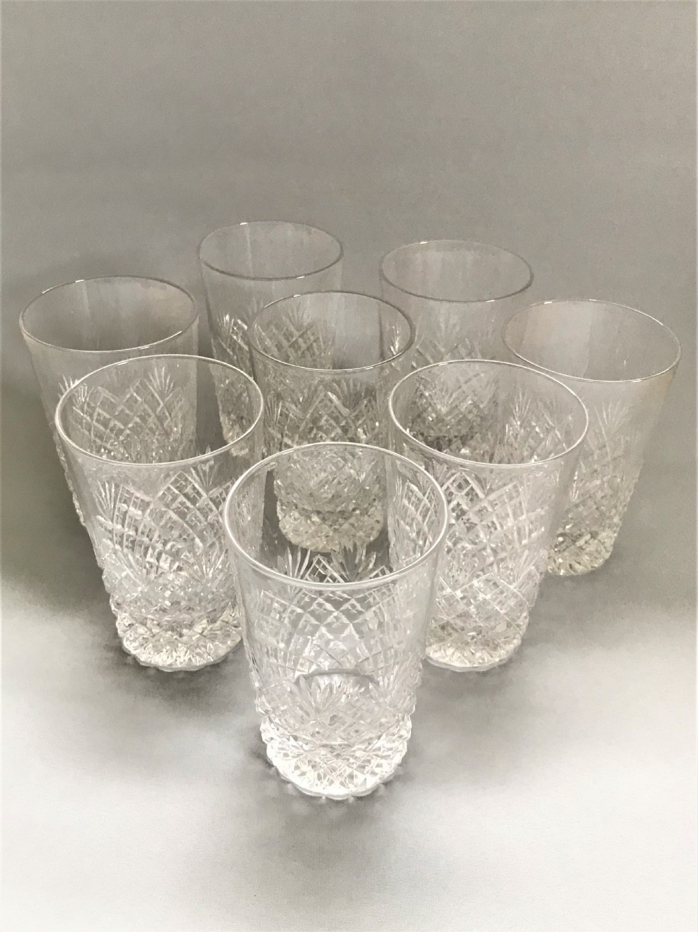 A superior set of 8 good quality cut glass water tumblers View II