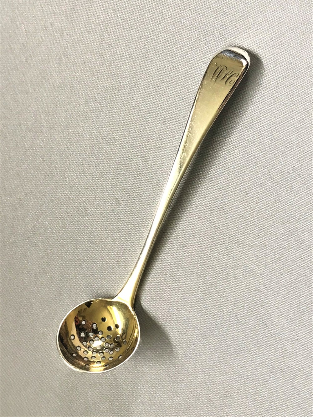 A small Georgian spice sifting ladle