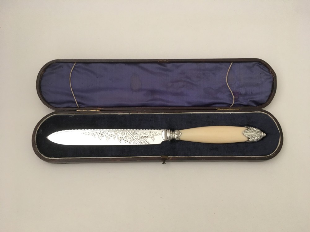 A superb Boxed Victorian Solid Silver Wedding Cake Knife