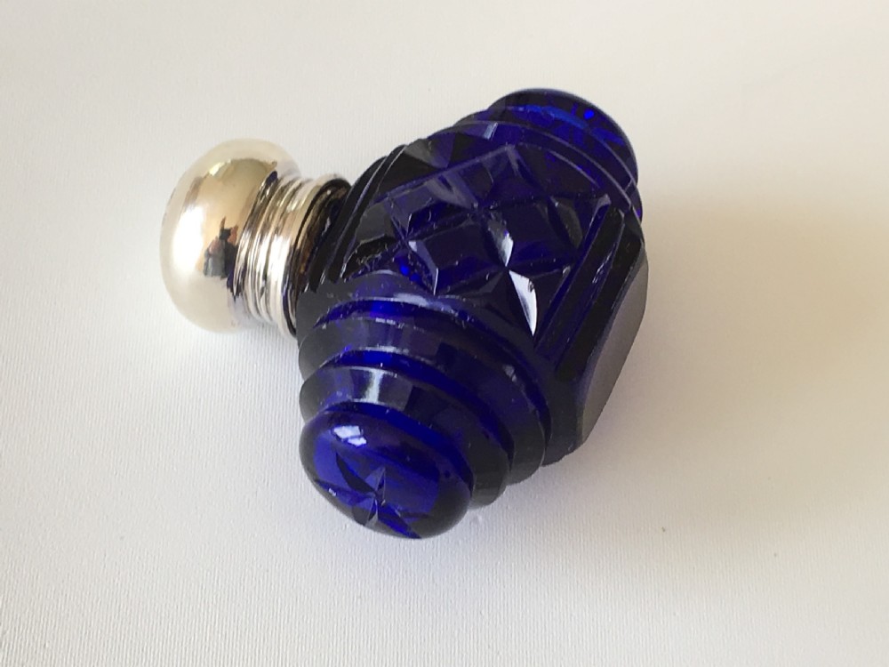 A lovely Barrel Cut Victorian Silver Mounted Scent Bottle View III
