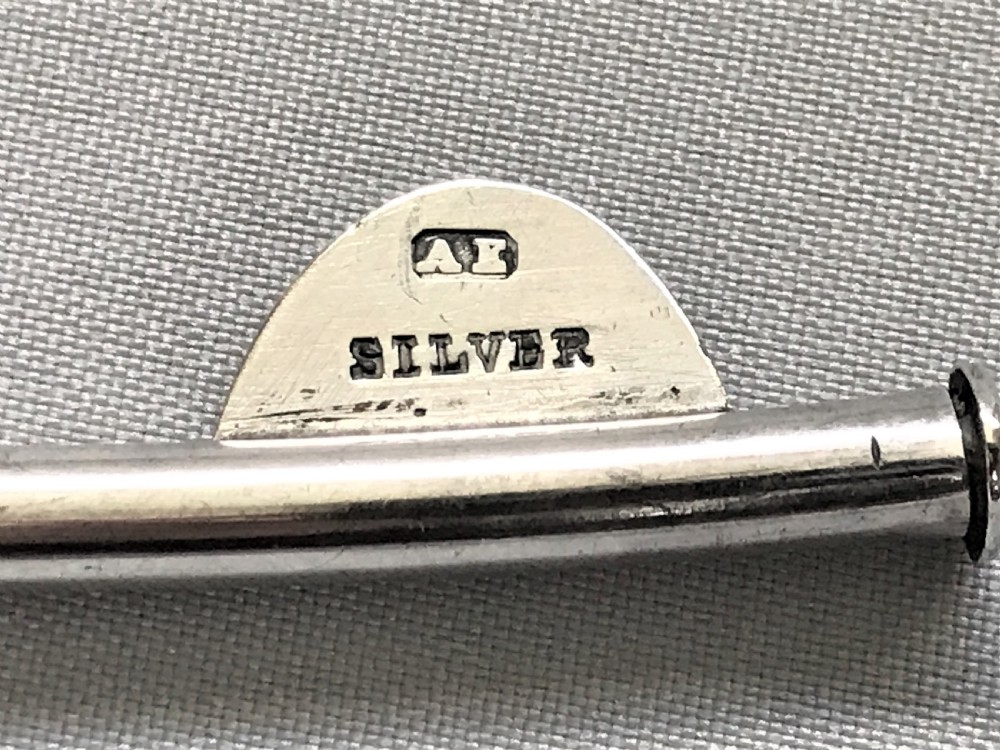 Medical interest. A rare female silver catheter  View III