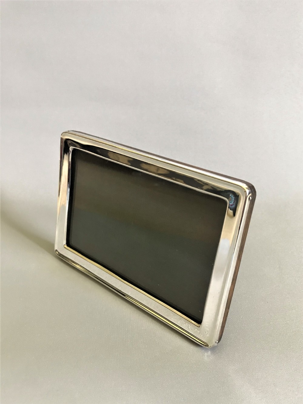 A stylish silver landscape format photo frame