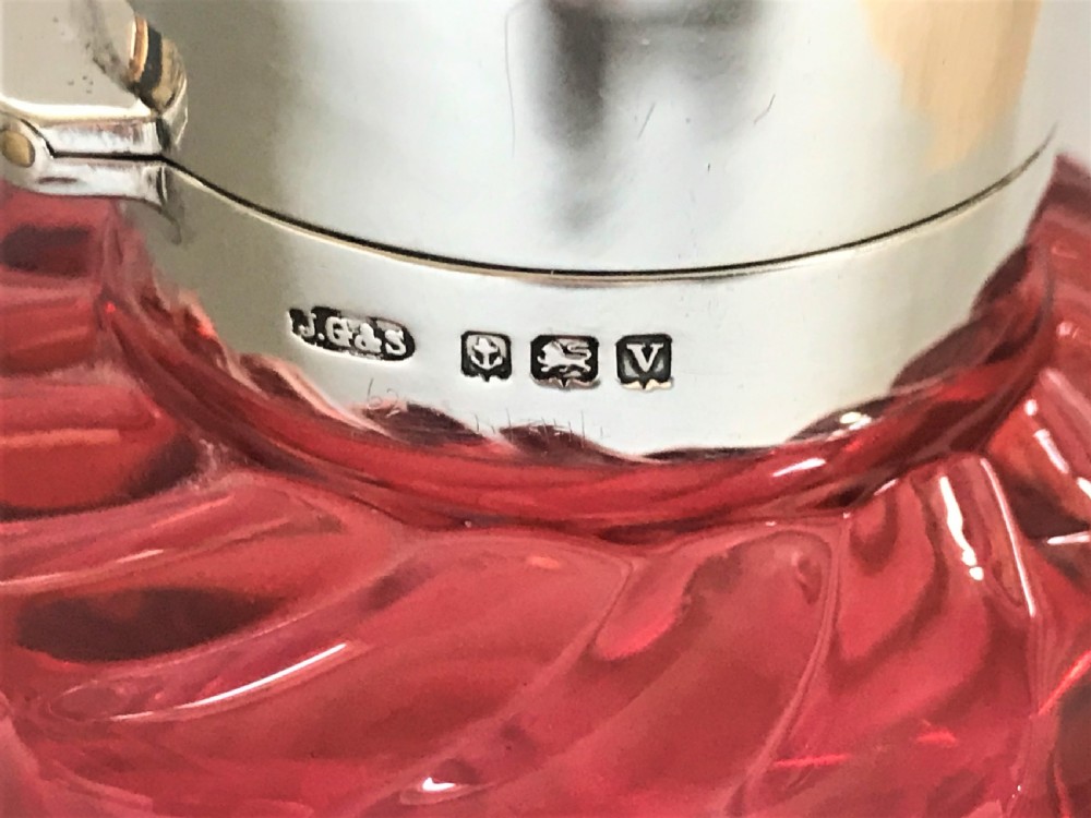 A silver mounted & cranberry glass cologne bottle View V