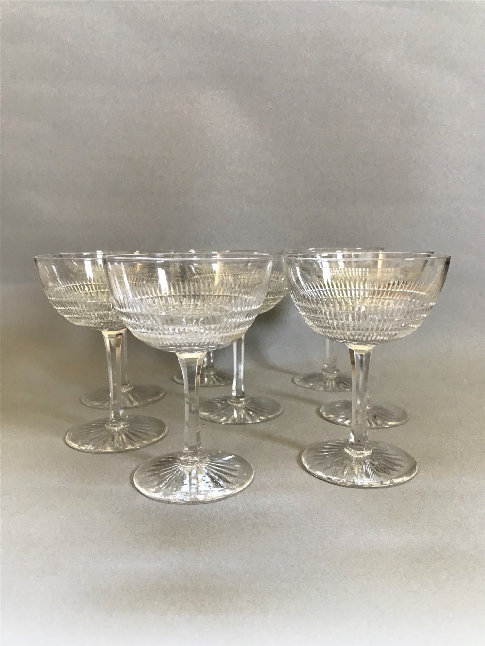 A fine set of 8 cut glass Edwardian champagne bowls View III