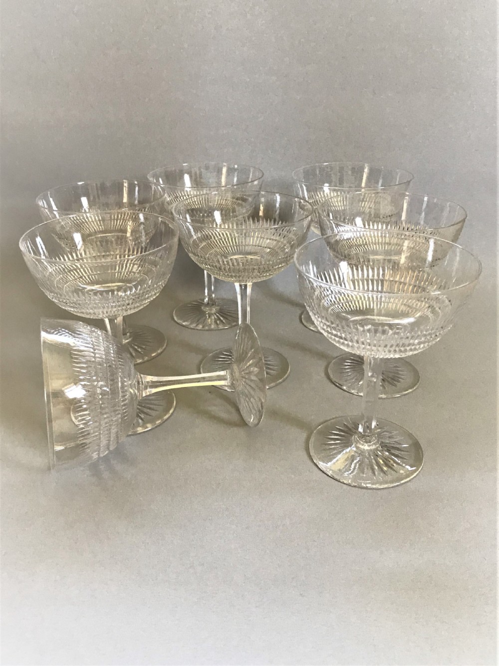 A fine set of 8 cut glass Edwardian champagne bowls View IV