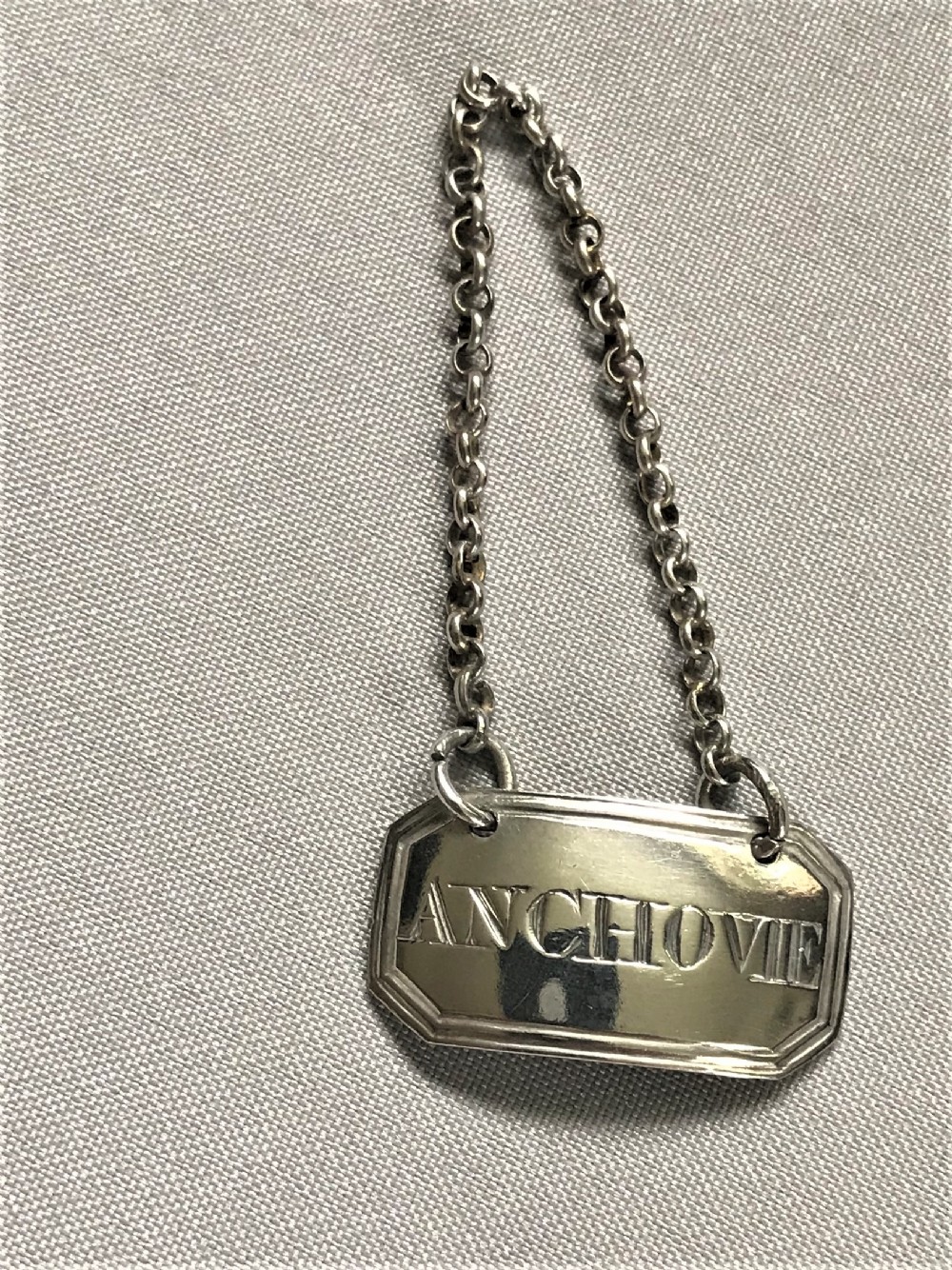 A rare Georgian silver 'Anchovie' sauce label