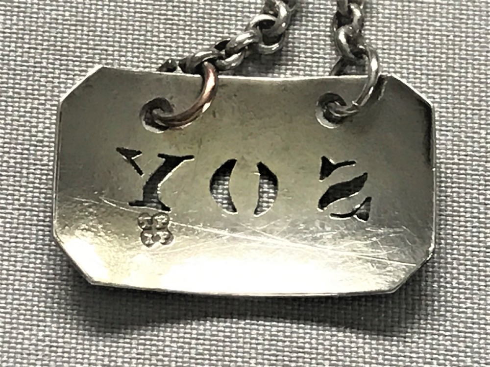 An 18th Century silver 'Soy' condiment label View II
