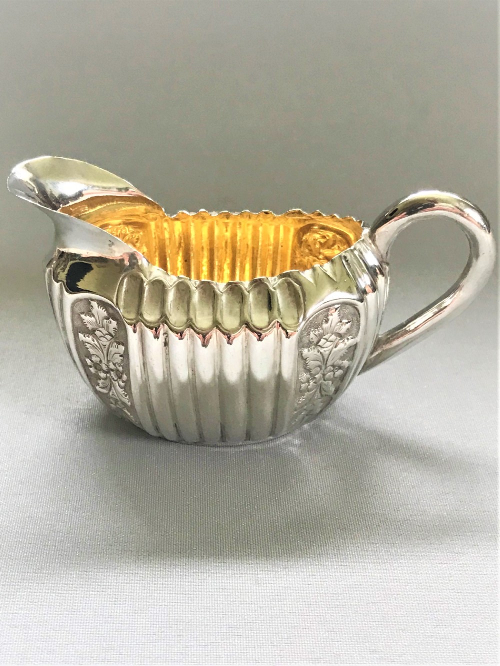 A charming Victorian silver 'solo' cream jug