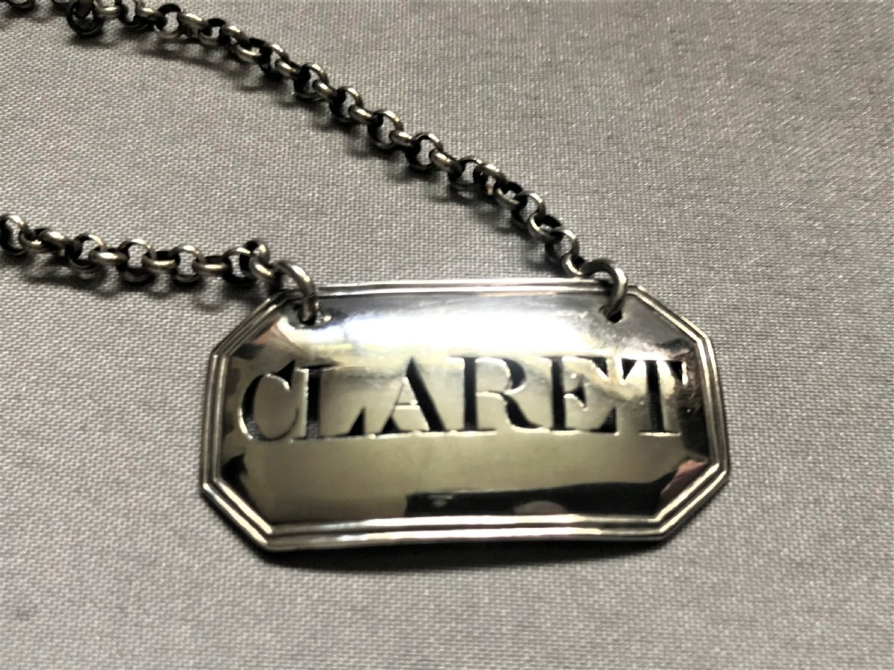 A lovely Georgian silver, claret decanter label View III