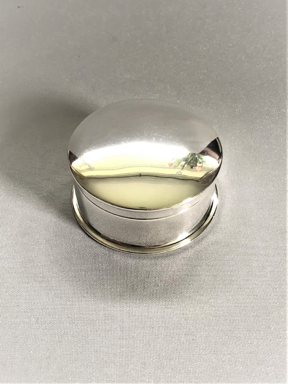 A large George V silver pill box