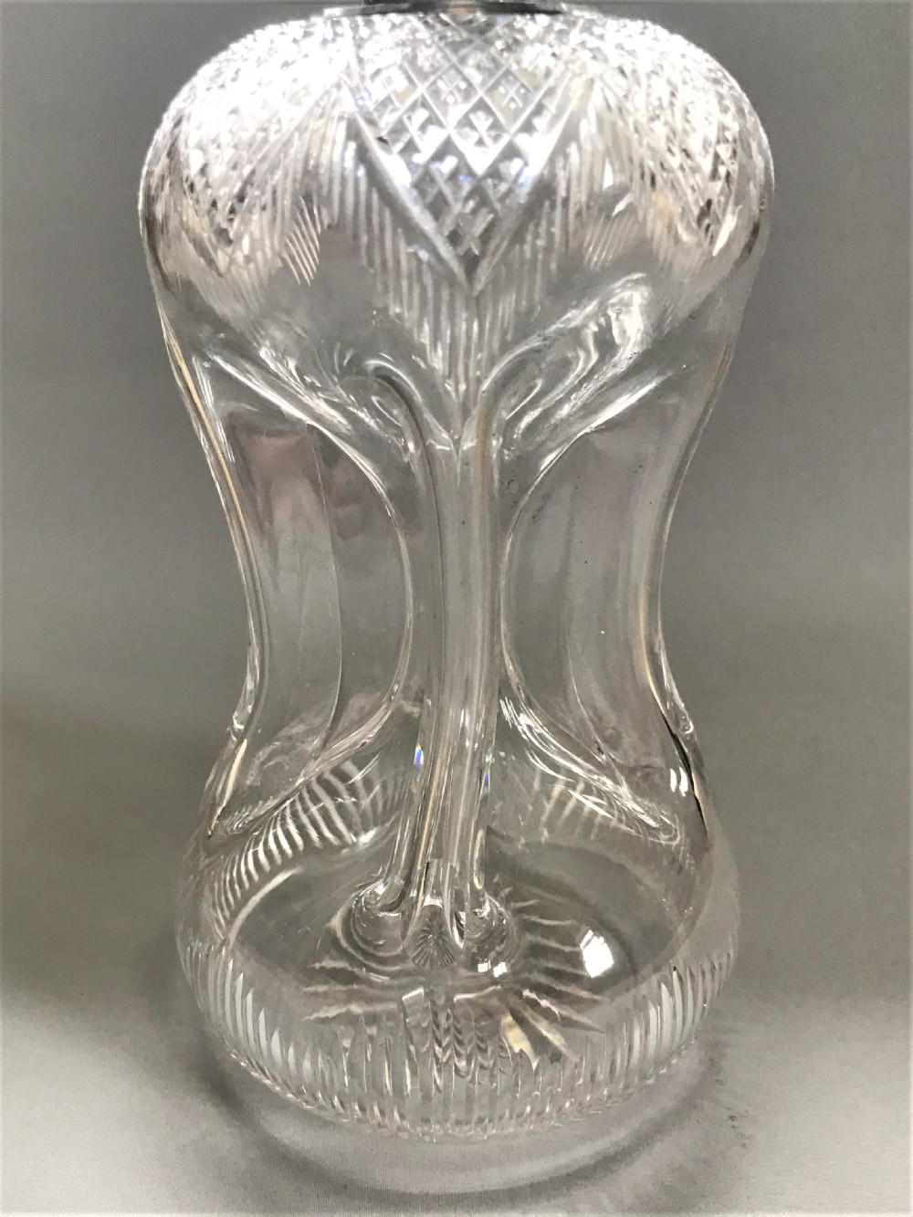 A superb Edwardian silver mounted glug glug decanter View V