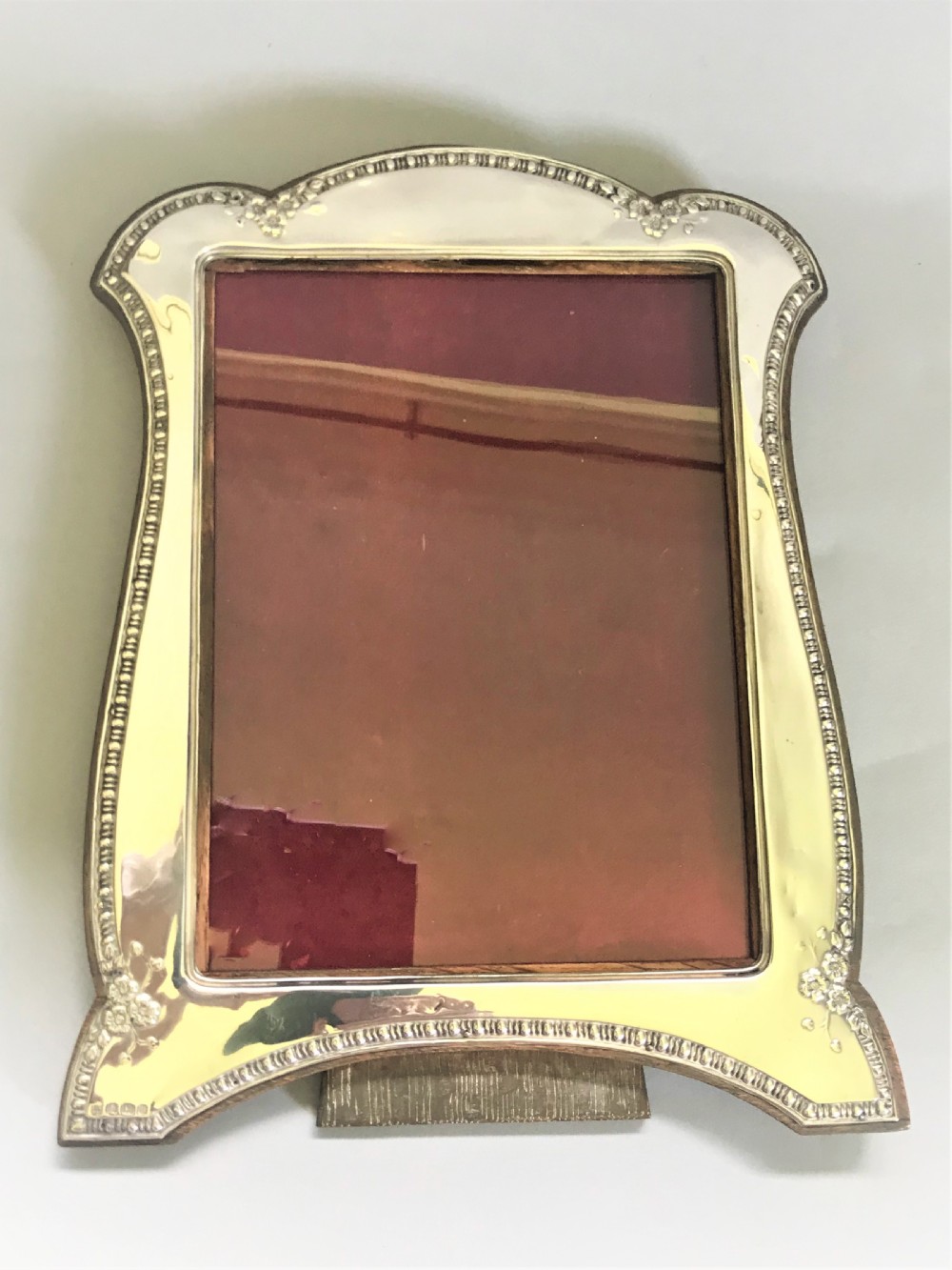 A large George V silver photo frame View IV