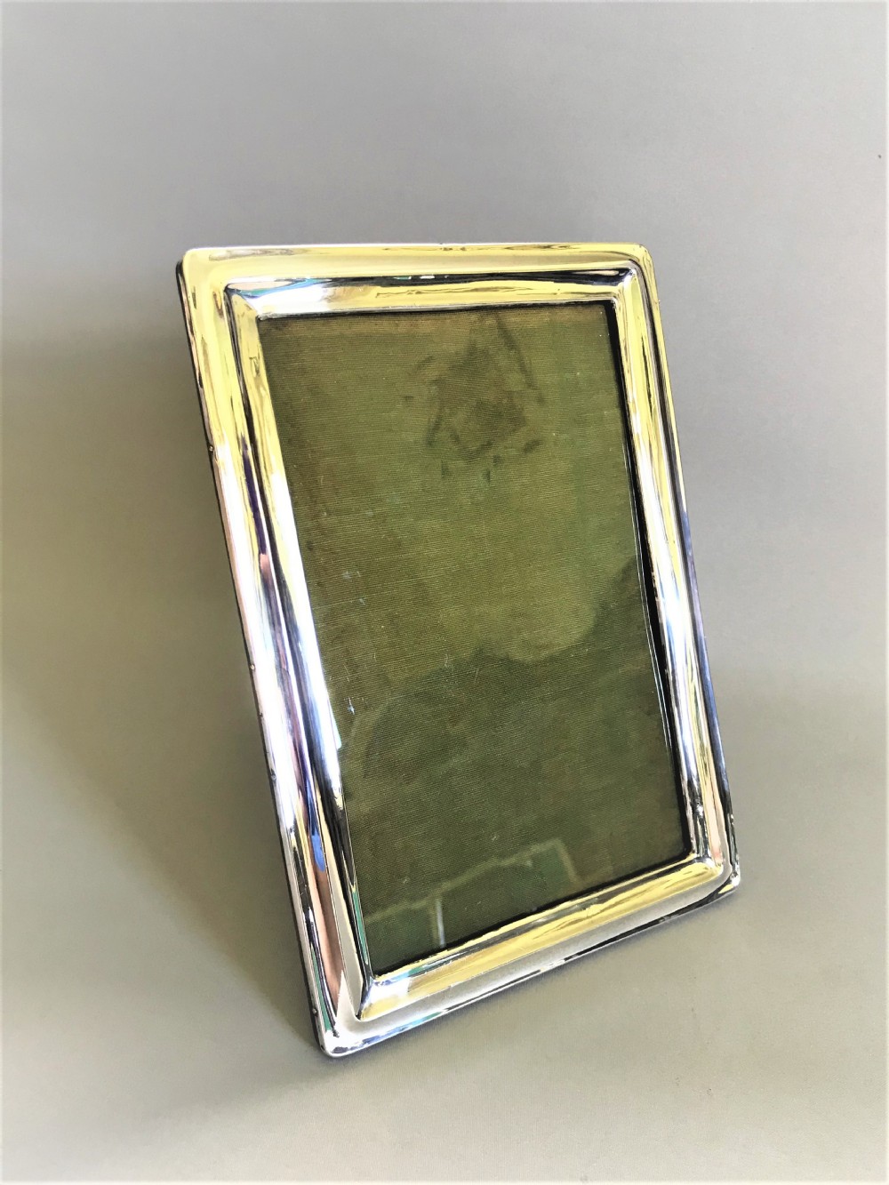 A handsome George V silver photo frame