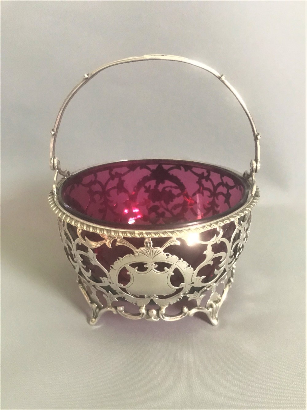 A wonderful Edwardian silver & cranberry basket View II