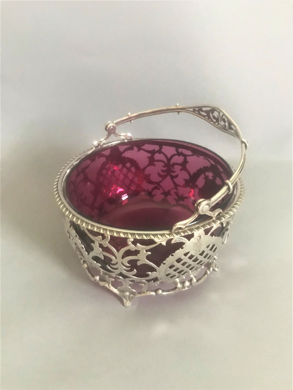 A wonderful Edwardian silver & cranberry basket View III