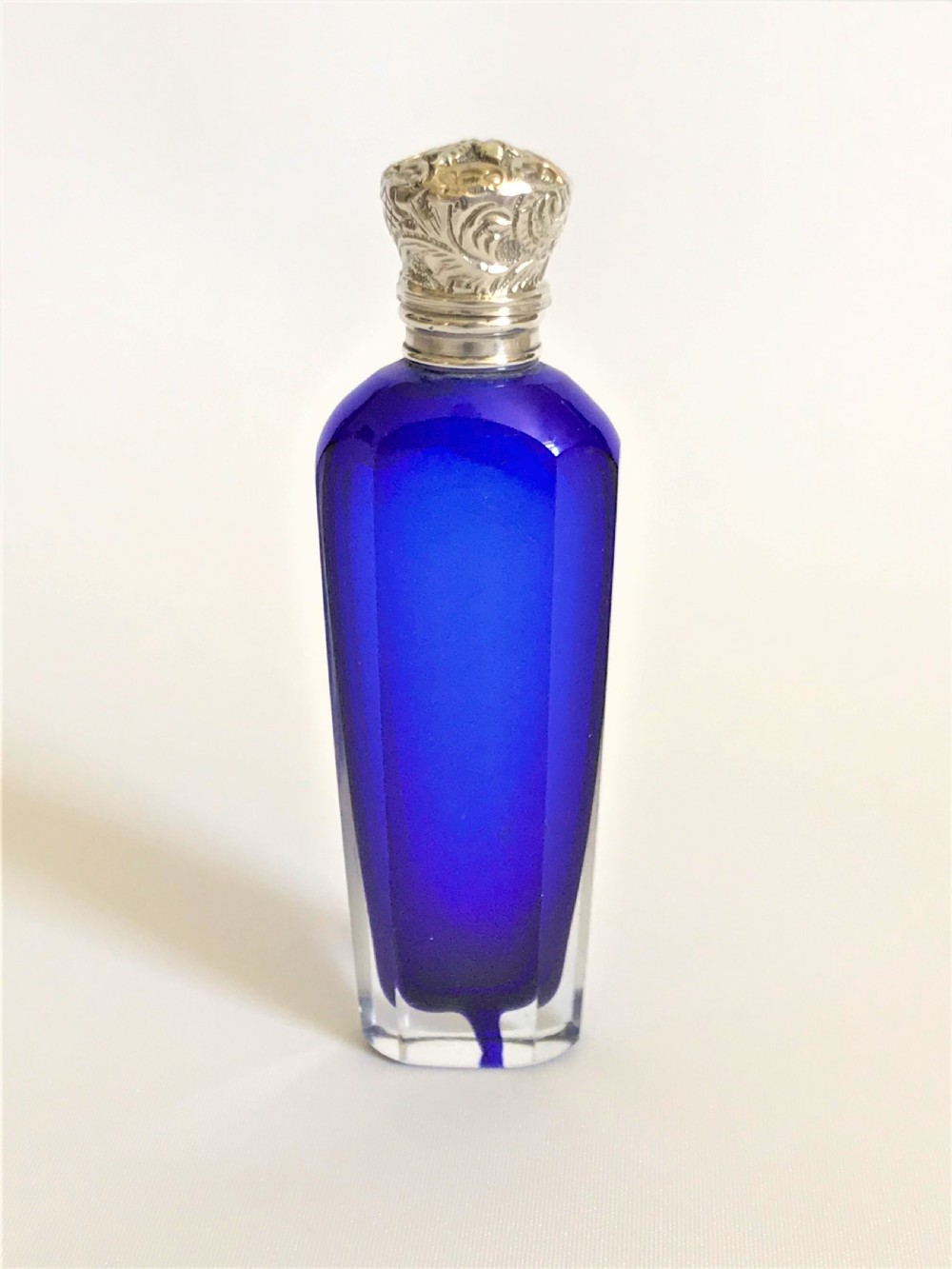 A lovely Victorian silver mounted scent bottle