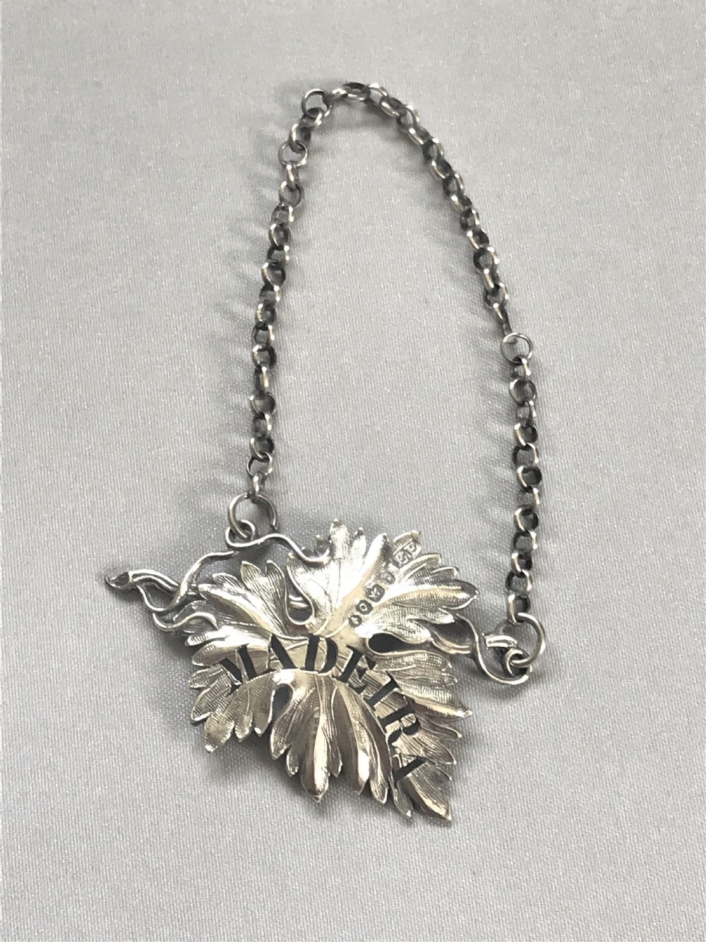 An attractive William IV silver Madeira label