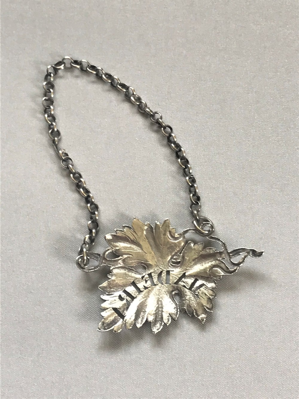 An attractive William IV silver Madeira label View II