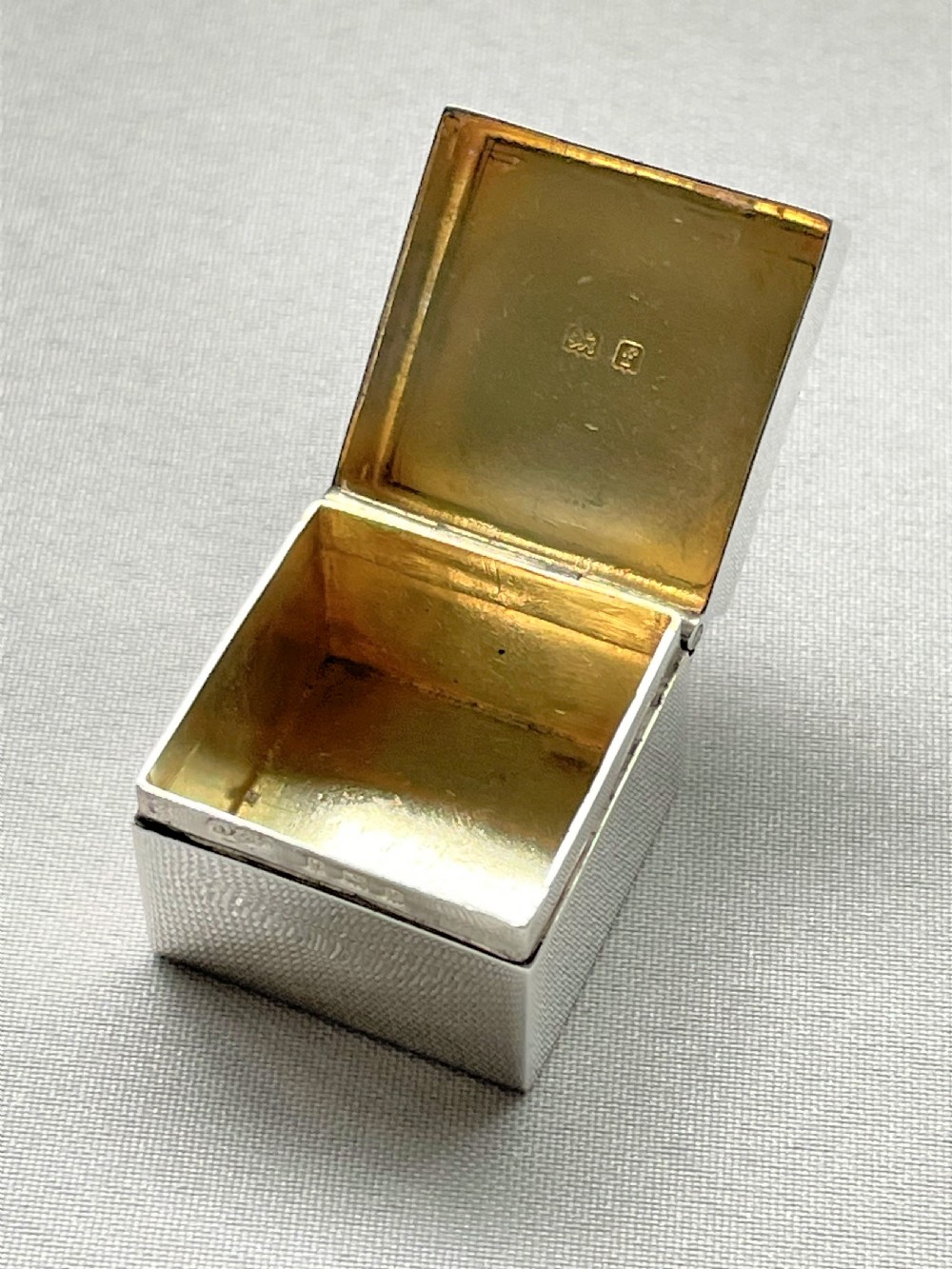 A good Edwardian square silver pill box View III