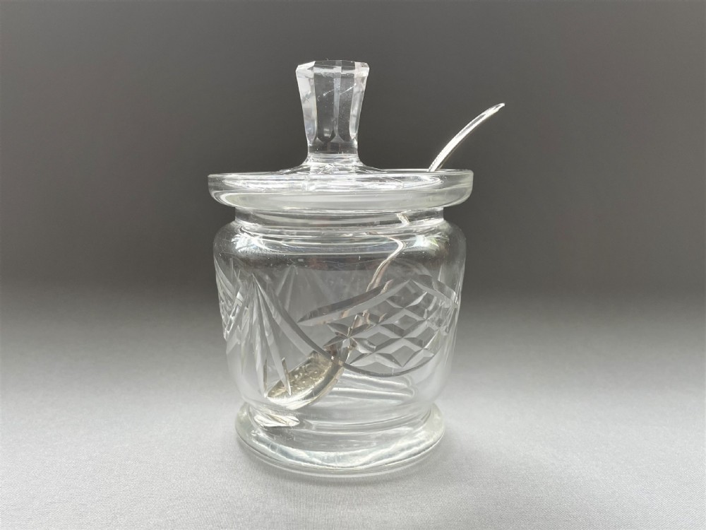 A cut glass Edwardian preserve jar with hallmarked silver spoon View III