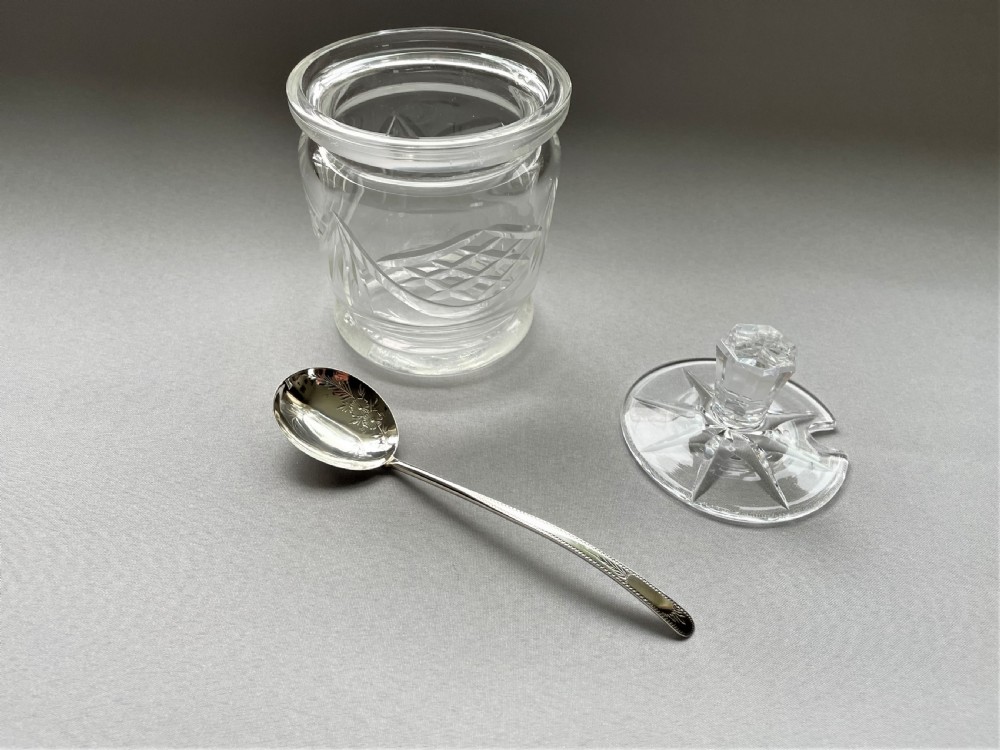 A cut glass Edwardian preserve jar with hallmarked silver spoon View IV