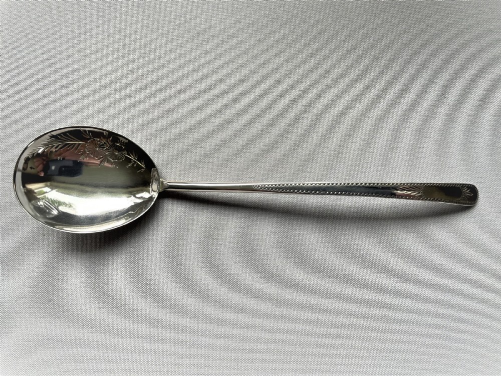 A cut glass Edwardian preserve jar with hallmarked silver spoon View V