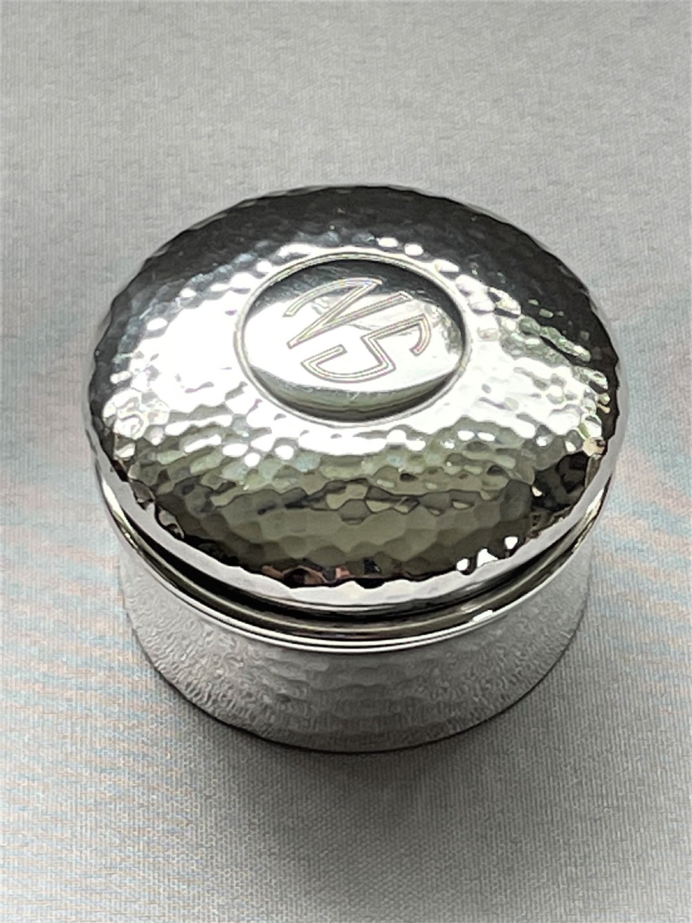 A large Arts & Crafts silver gilt pill box