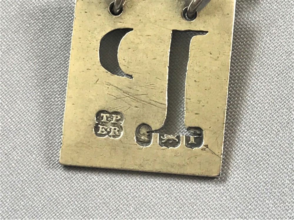 A good Georgian Regency silver Port Label View III