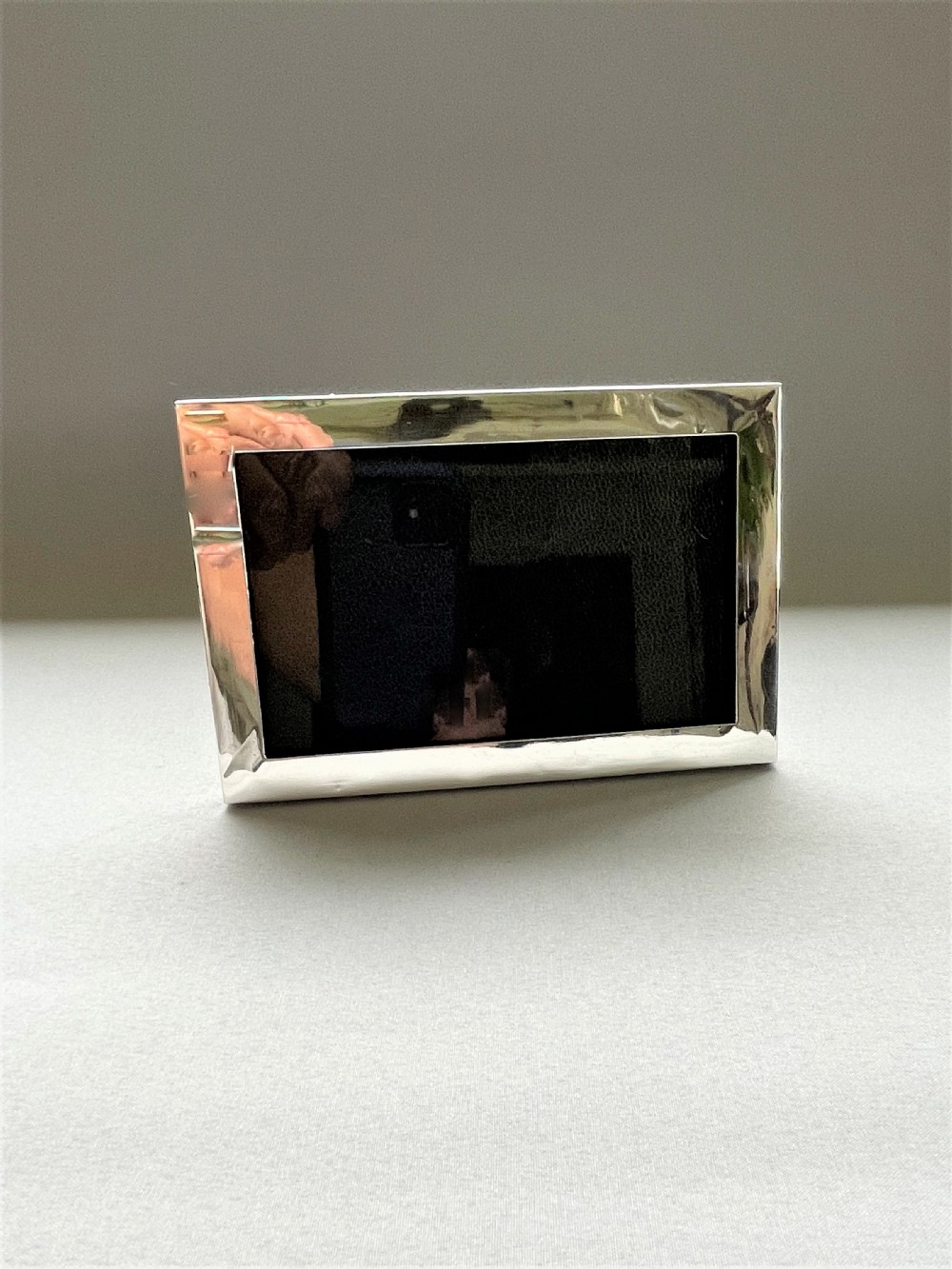A desirable silver landscape/portrait photo frame View III