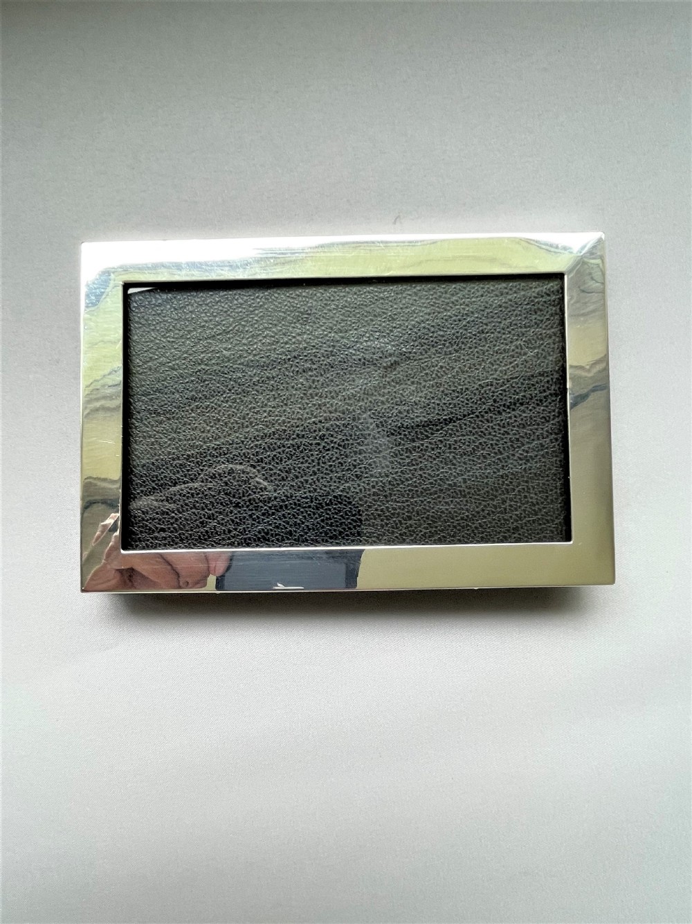 A desirable silver landscape/portrait photo frame View V